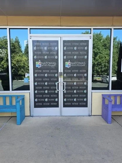 the integration of aesthetic customization, structural security, and high-traffic accessibility required for modern commercial door features