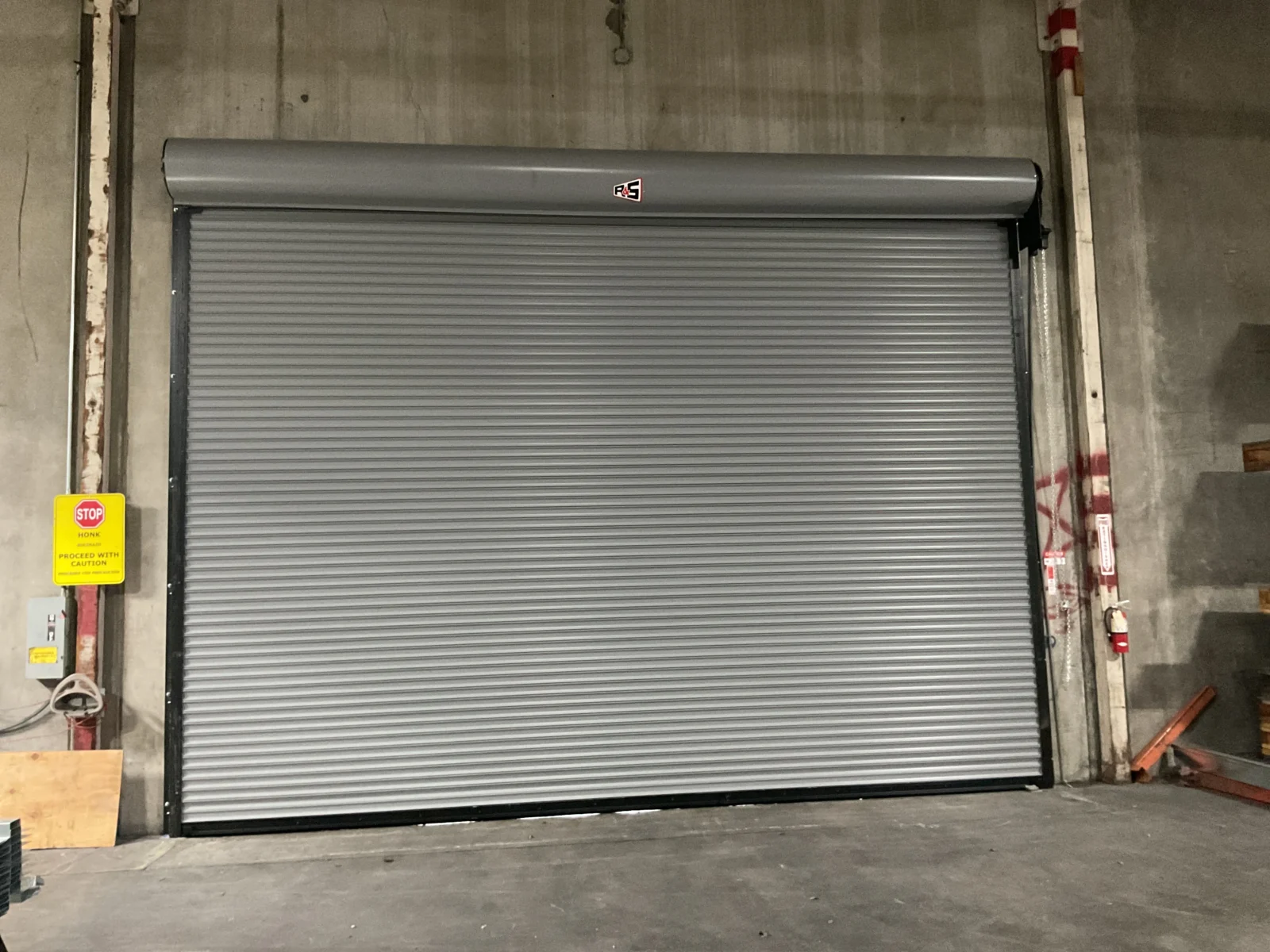 the structural durability and routine maintenance protocols needed to maximize a commercial rolling doors lifespan